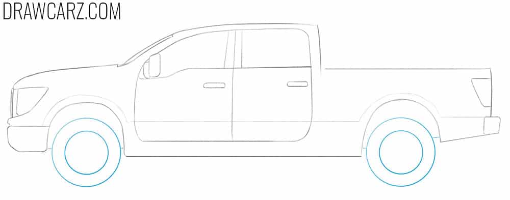 Sketch the tires with concentric rim outlines