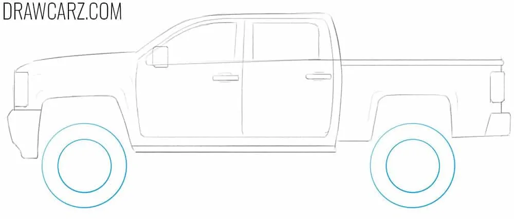 Add the large wheels with concentric rims
