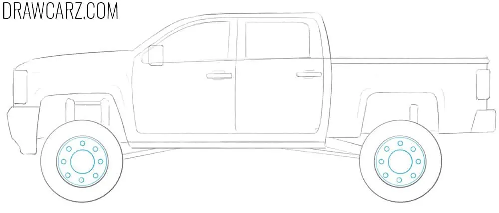 Add the truck’s central hub and lug nuts