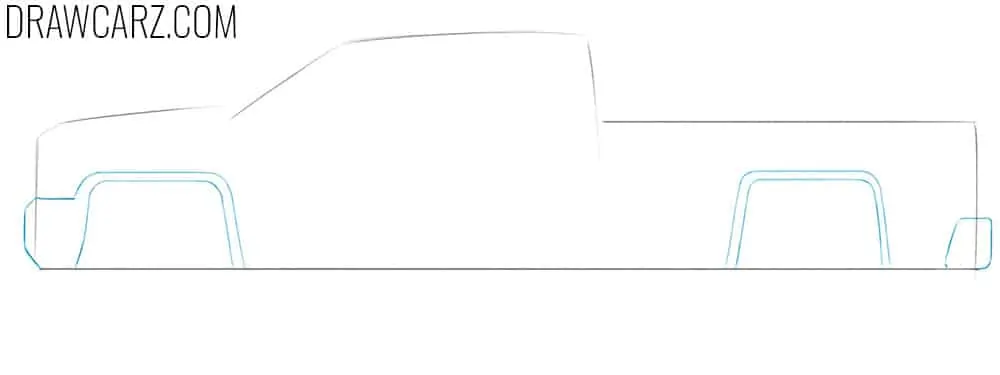 Draw the pickup truck’s fenders and bumpers