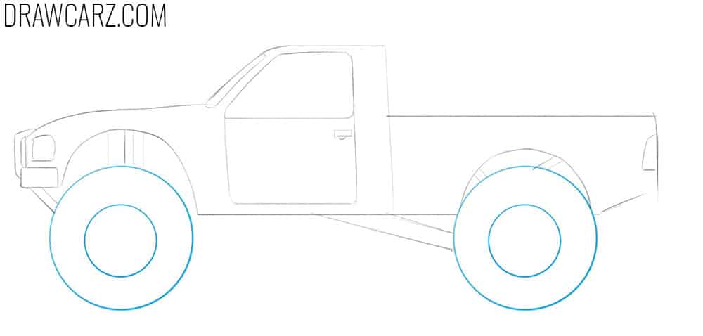 Draw the large off-road truck wheels