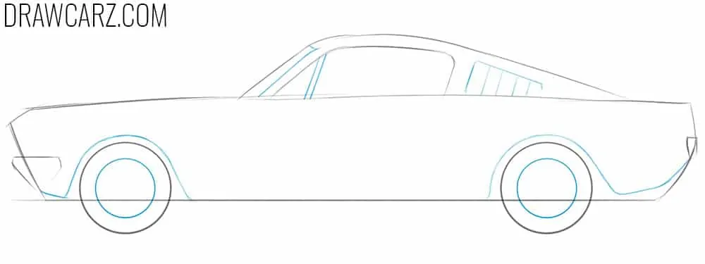 Outline the windshield, wheel arches, and rims