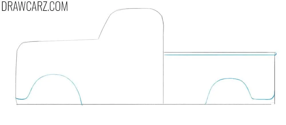 Mark the rounded wheel arches and cargo border
