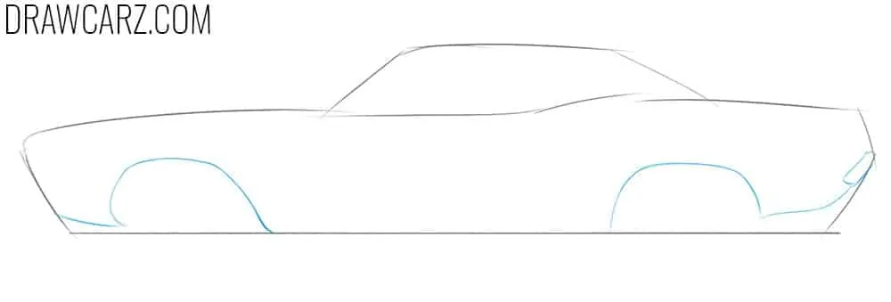 Draw the car’s wheel arches 